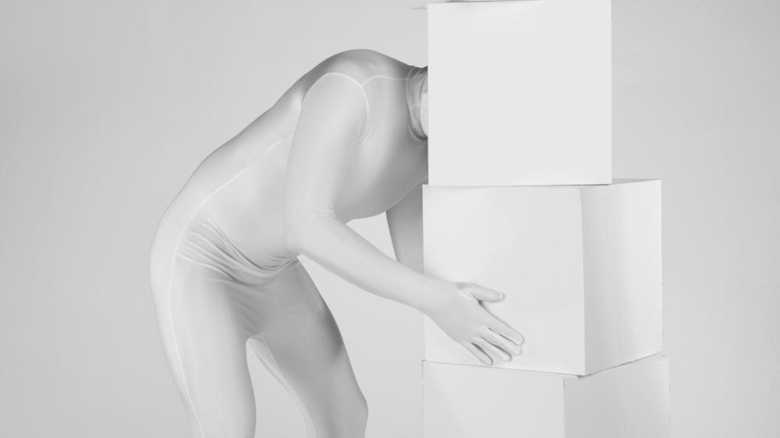 image of figure and stack of cubes